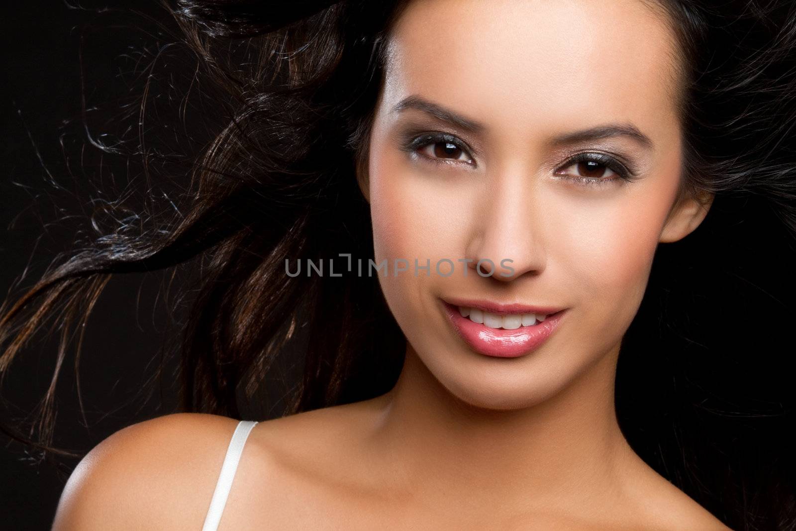 Smiling pretty young latino woman