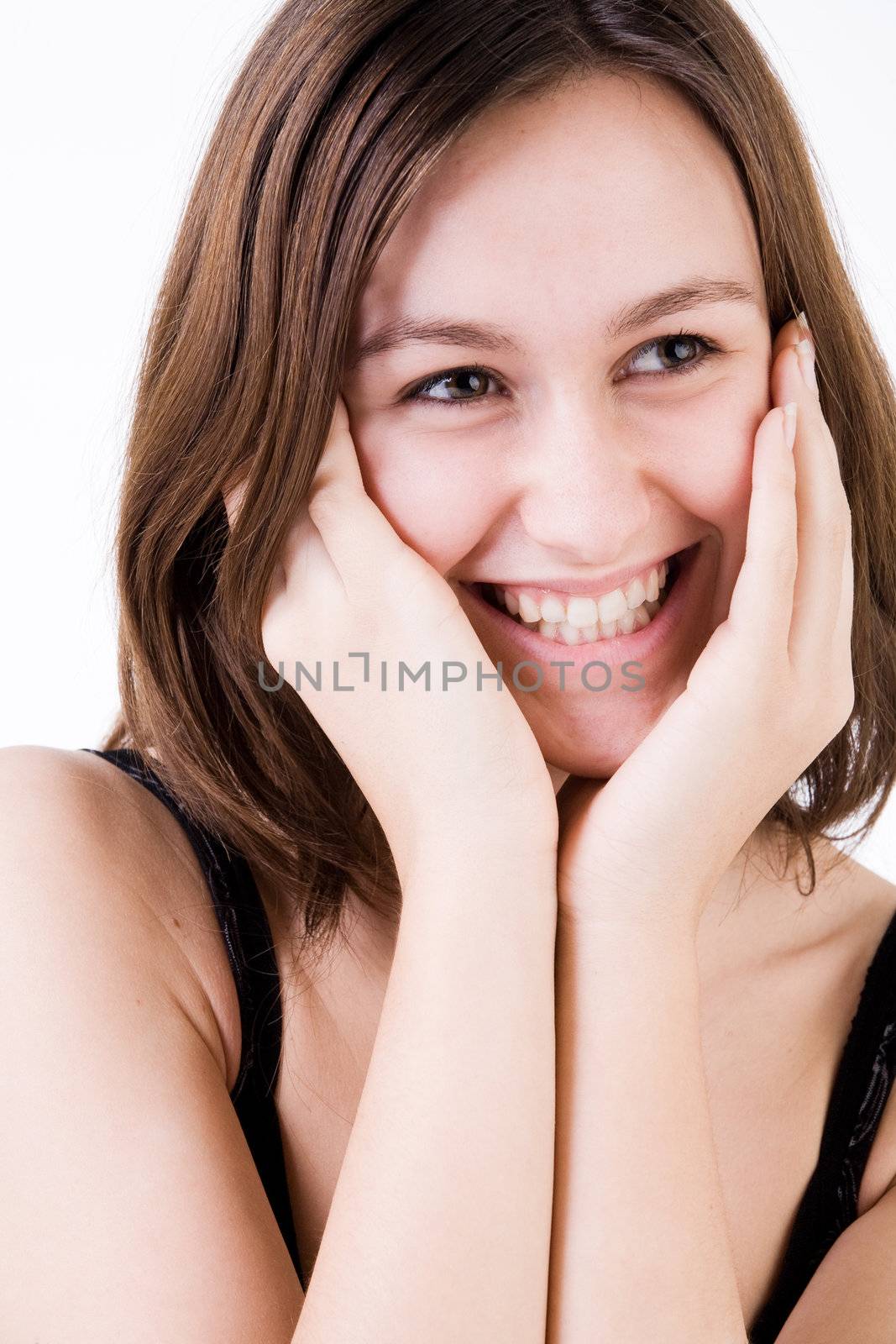 Young woman portrait in the studio on a white background