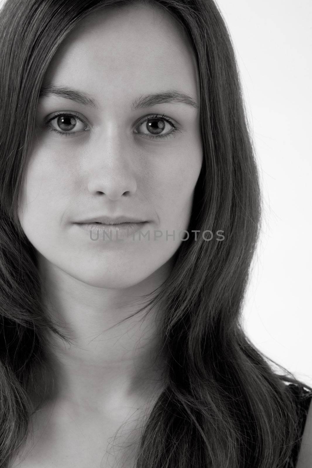 Young woman portrait in the studio on a white background