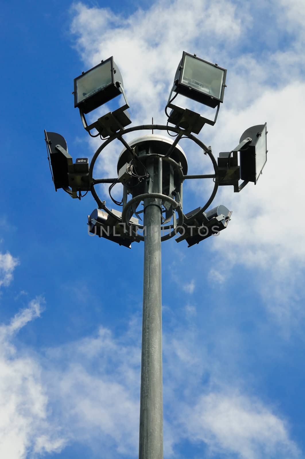 Spot light lamp post in blue sky