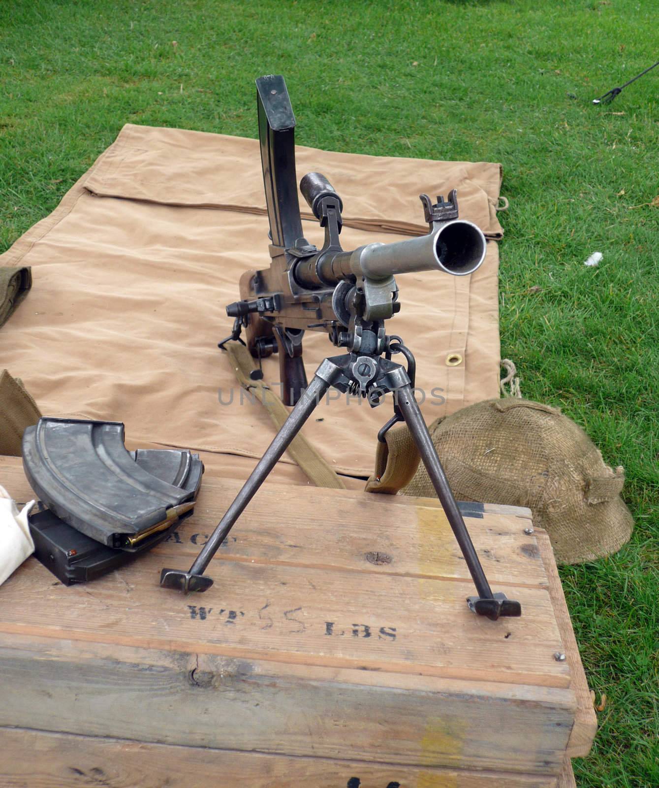 World war two british machine gun set up on a vintage box