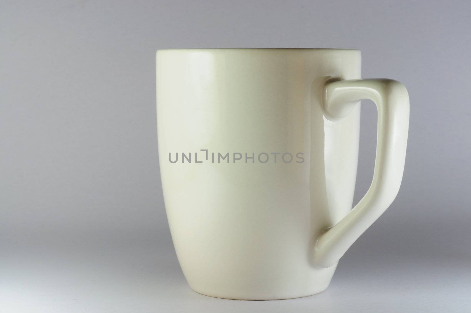 white ceramic cup