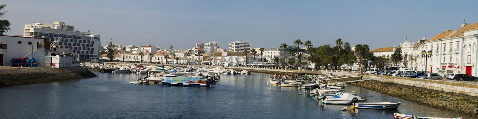 View of the marina with traditional fishing boats on Faro,  Portugal.