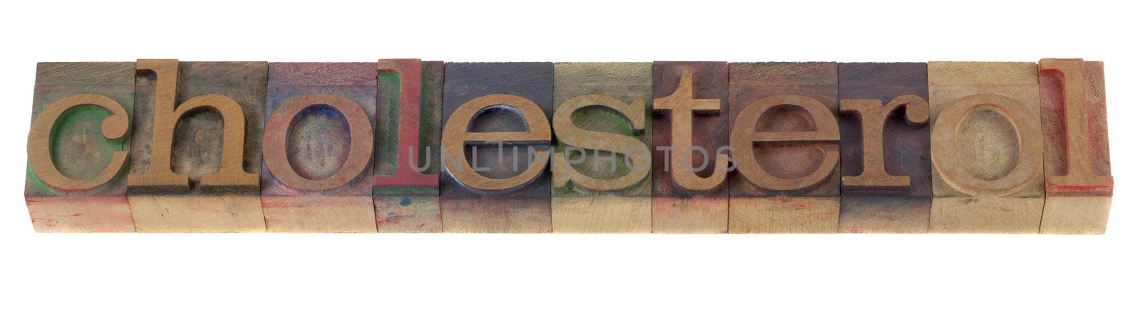 cholesterol - word in vintage letterpress printing blocks, stained by color inks, isolated on white