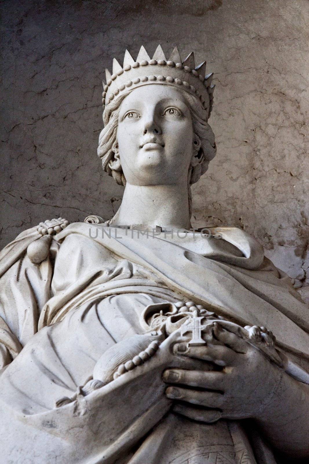 Close view of a statue of a women located on the entrance of the National Palace of Ajuda in Lisbon, Portugal.