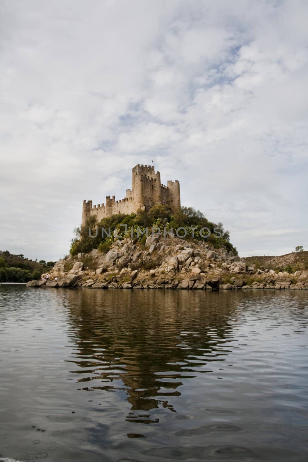 View of the beautiful Almourol castle located on a small island on the middle of the Tagus river, Portugal.