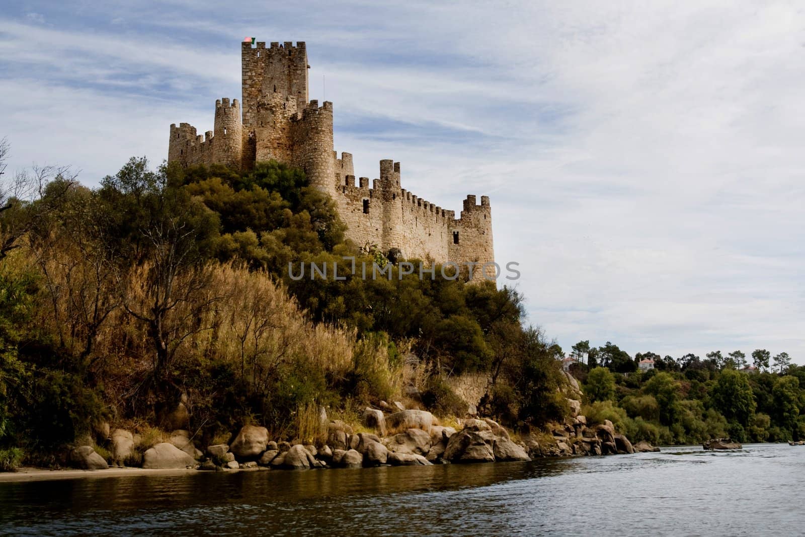 View of the beautiful Almourol castle located on a small island on the middle of the Tagus river, Portugal.