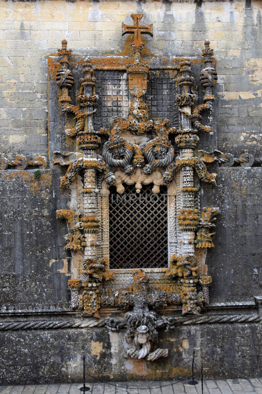 Famous window of the beautiful landmark monument called Convent of Christ in Tomar, Portugal.