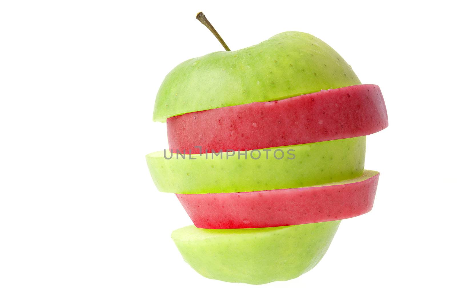 Red and green sliced apple isolated on white background.