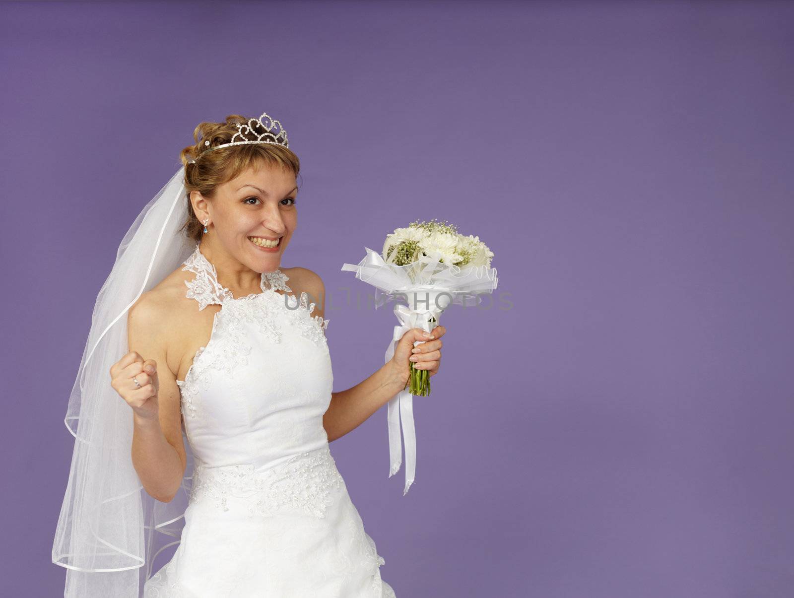 A very happy bride on a purple background