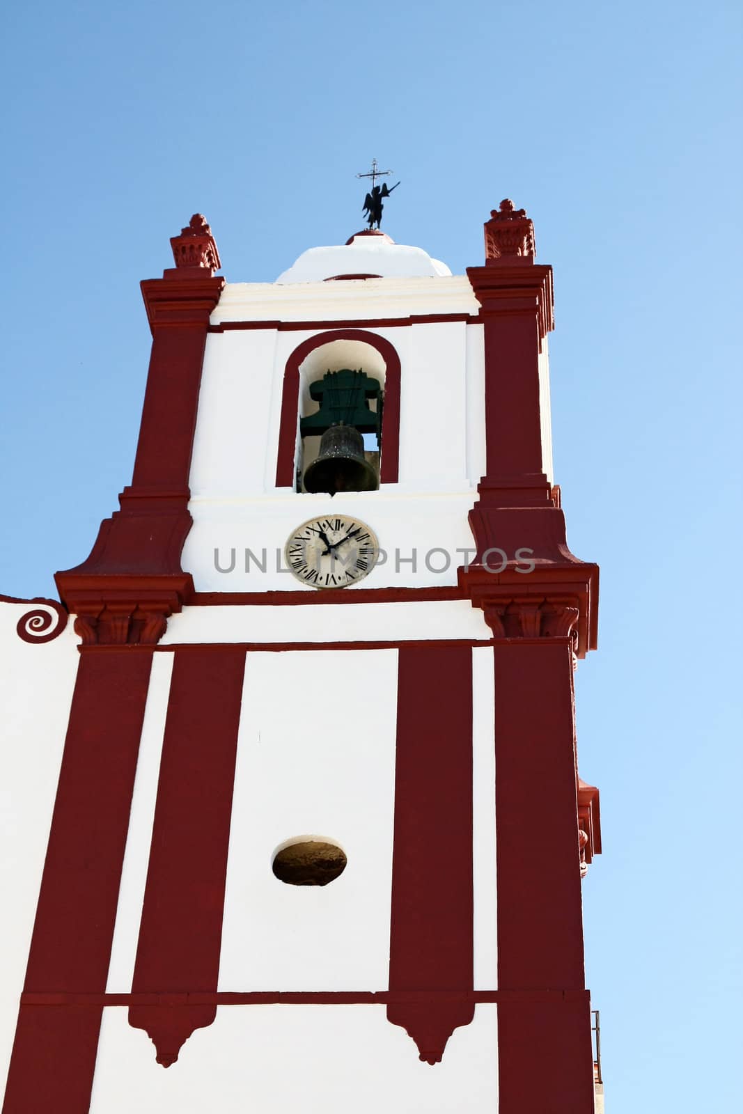 Close view of the bell tower section of a church located in Silves, Portugal