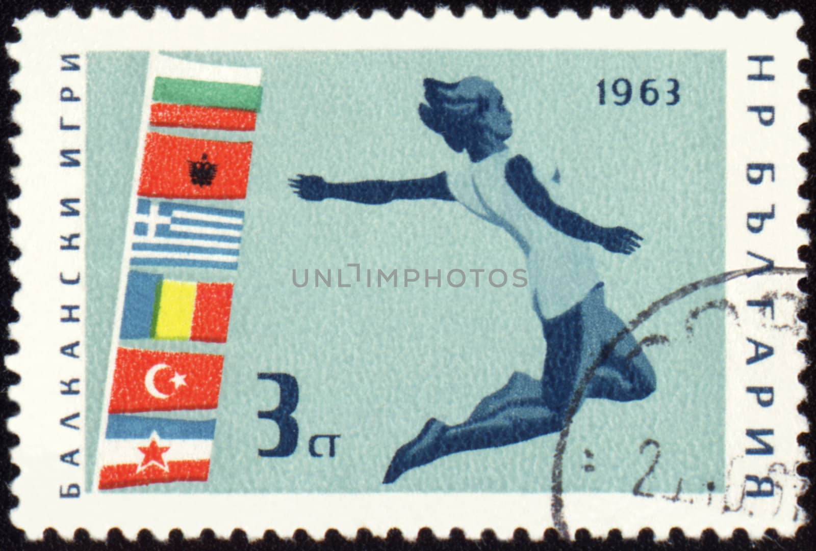 BULGARIA - CIRCA 1963: A post stamp printed in Bulgaria shows jumping athlete, devoted to Balkan games, series, circa 1963