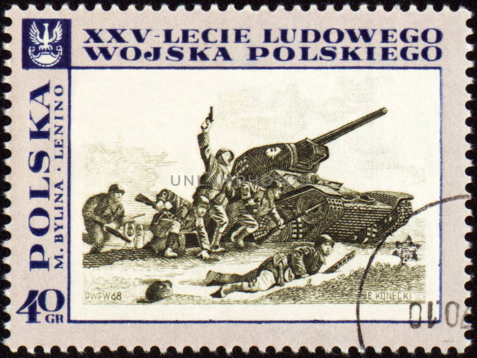 POLAND - CIRCA 1968: A post stamp printed in Poland shows tank attack, devoted to the 25th anniversary of Polish Army, circa 1968