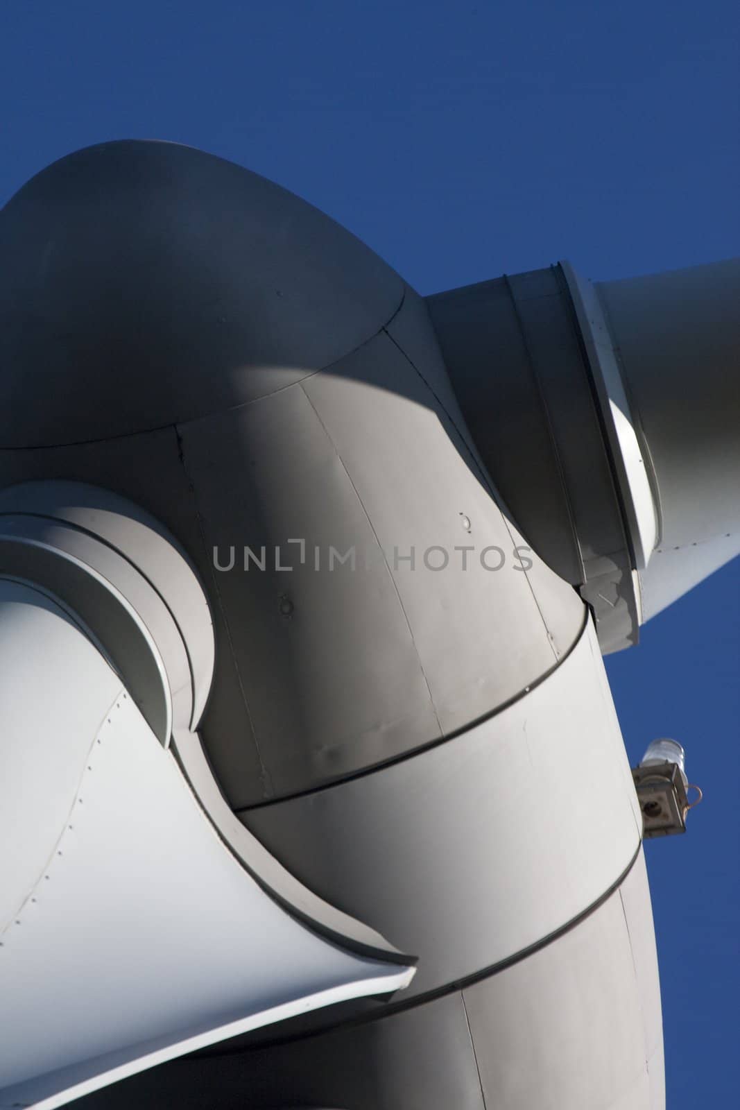 Close up view of the turbine of an eolic energy generator windmill.