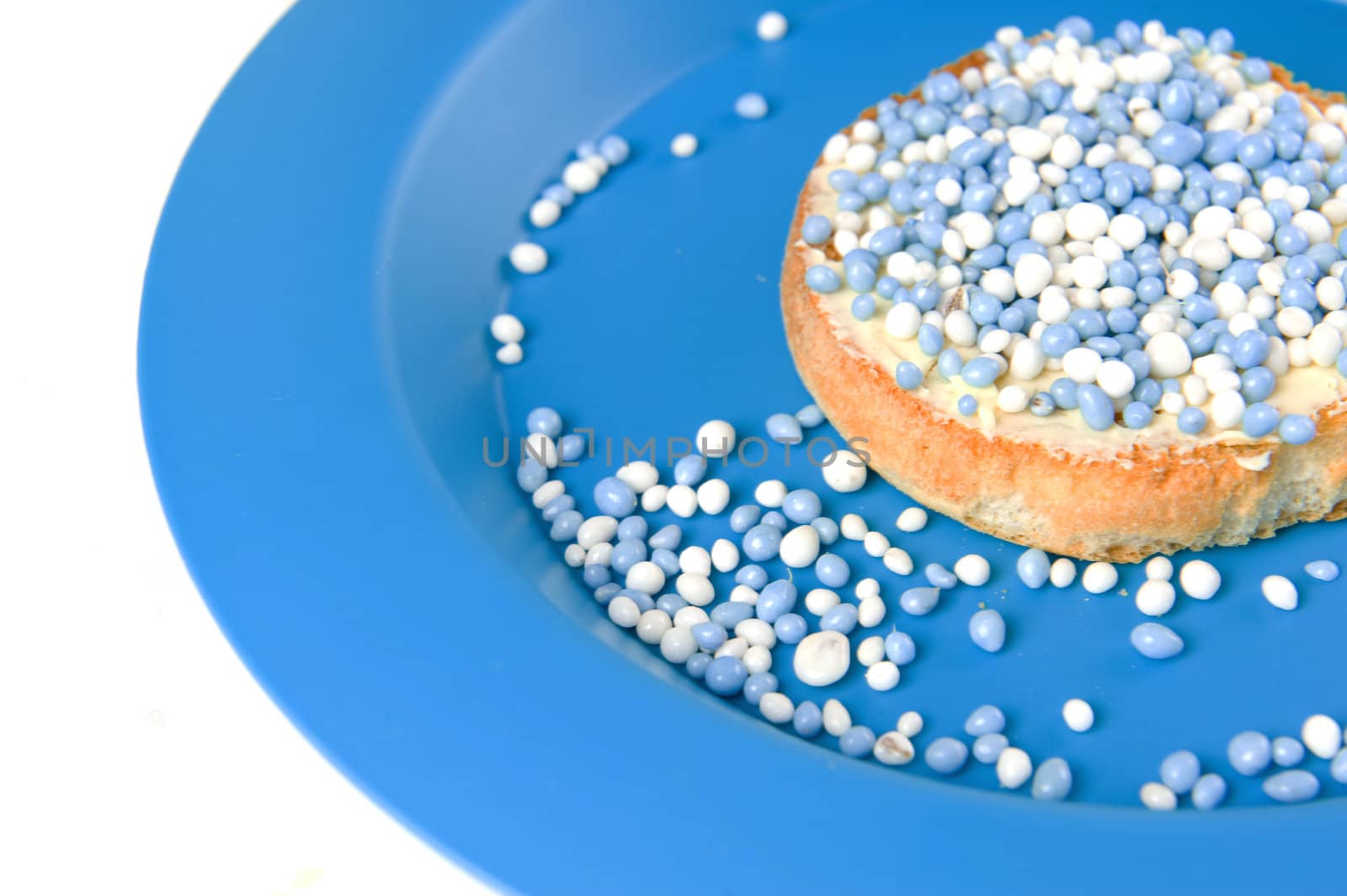 a rusk with blue and white mice, a dutch tradition