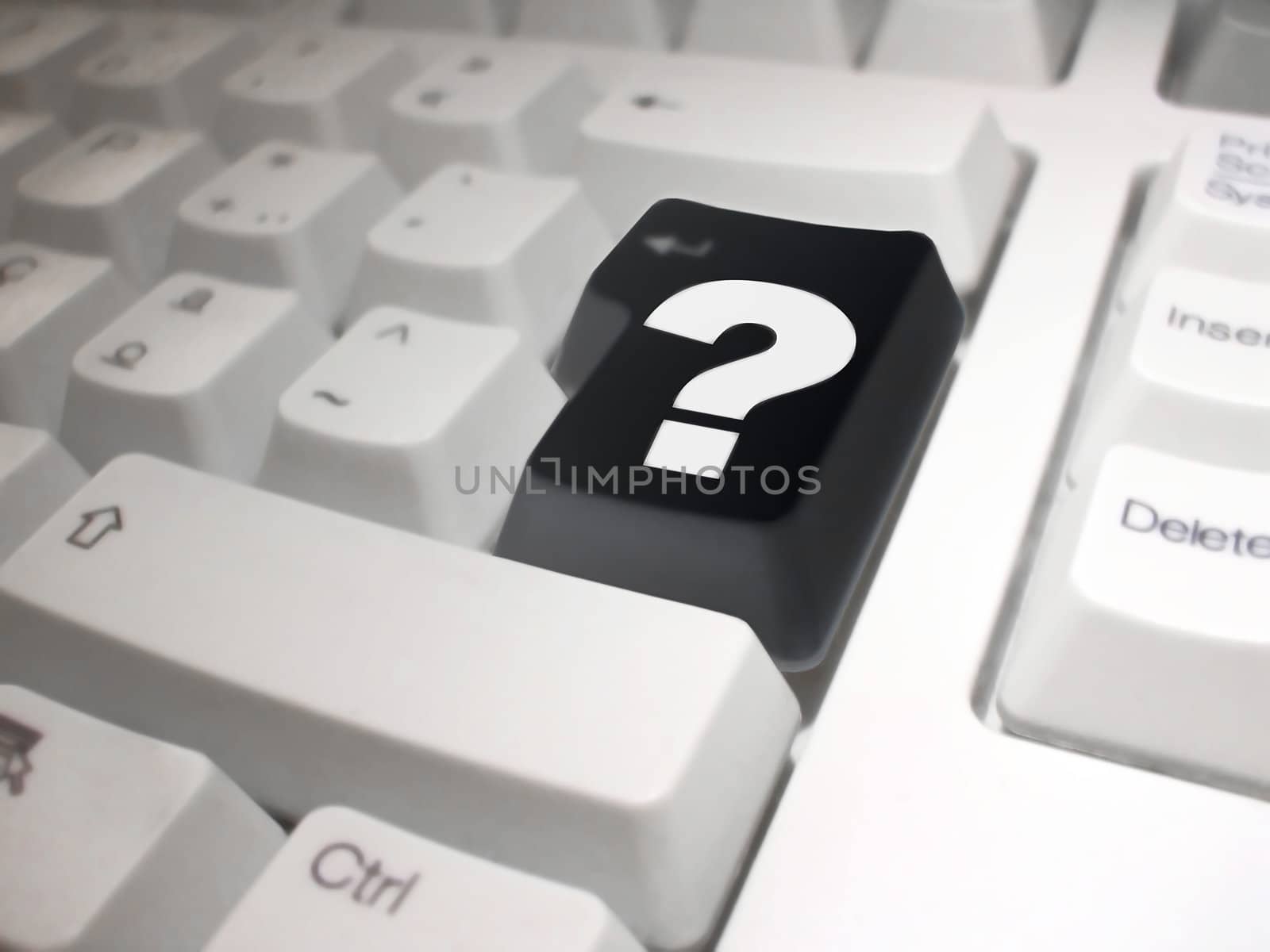 question mark on black enter key on a white background.