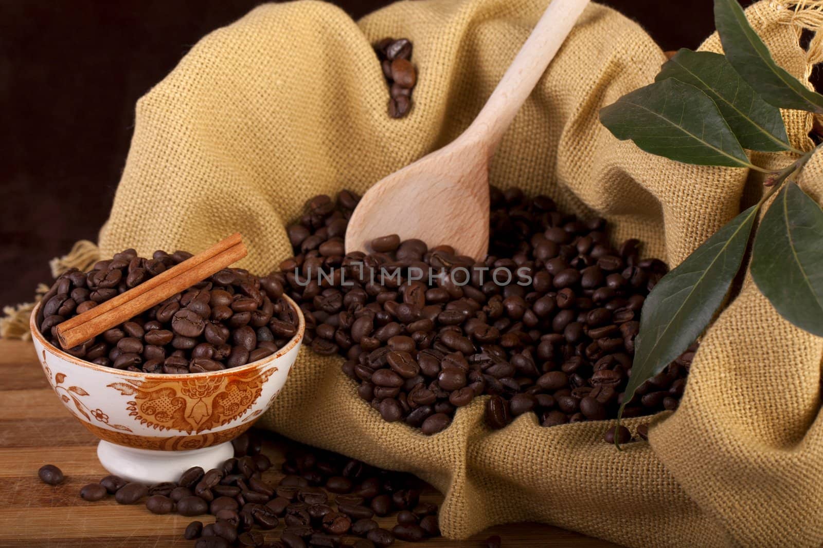 beans of coffee on a bowl by membio