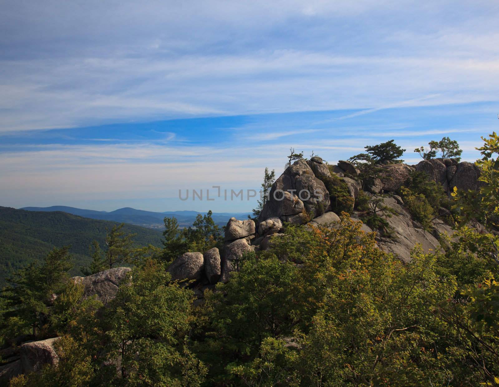 Rocks over valley in the Shenandoah on a climb of Old Rag