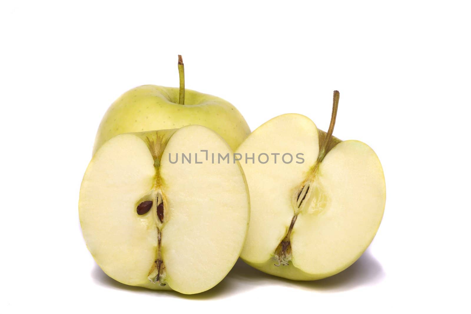 Close view of a bunch of yellow ginger gold variety type apples isolated on a white background.