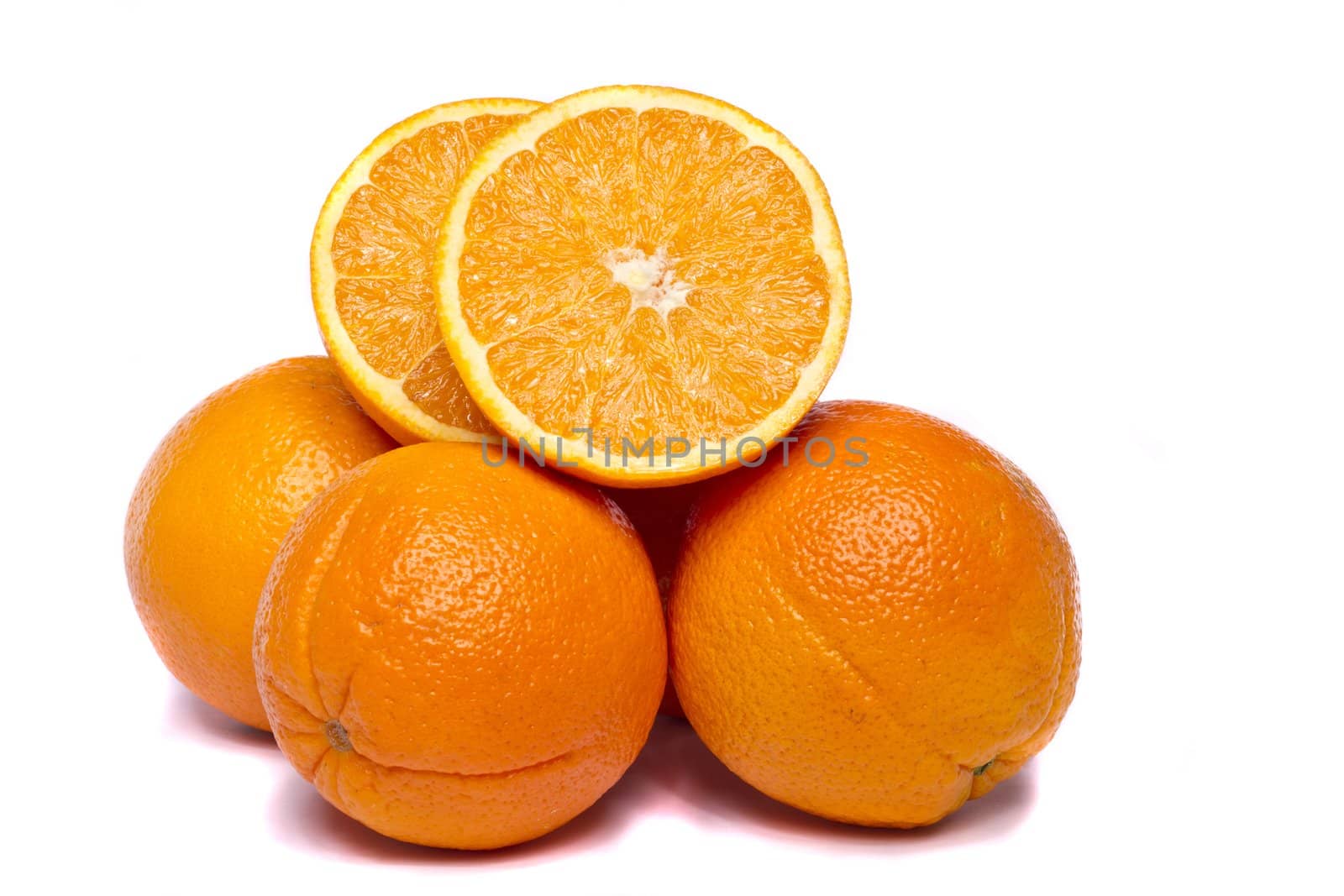 Close view of a bunch of oranges isolated on a white background