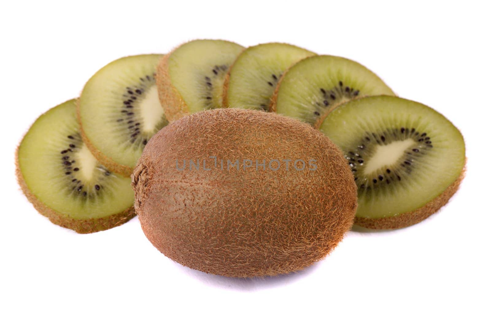close view of a bunch of kiwi fruit isolated on a white background.