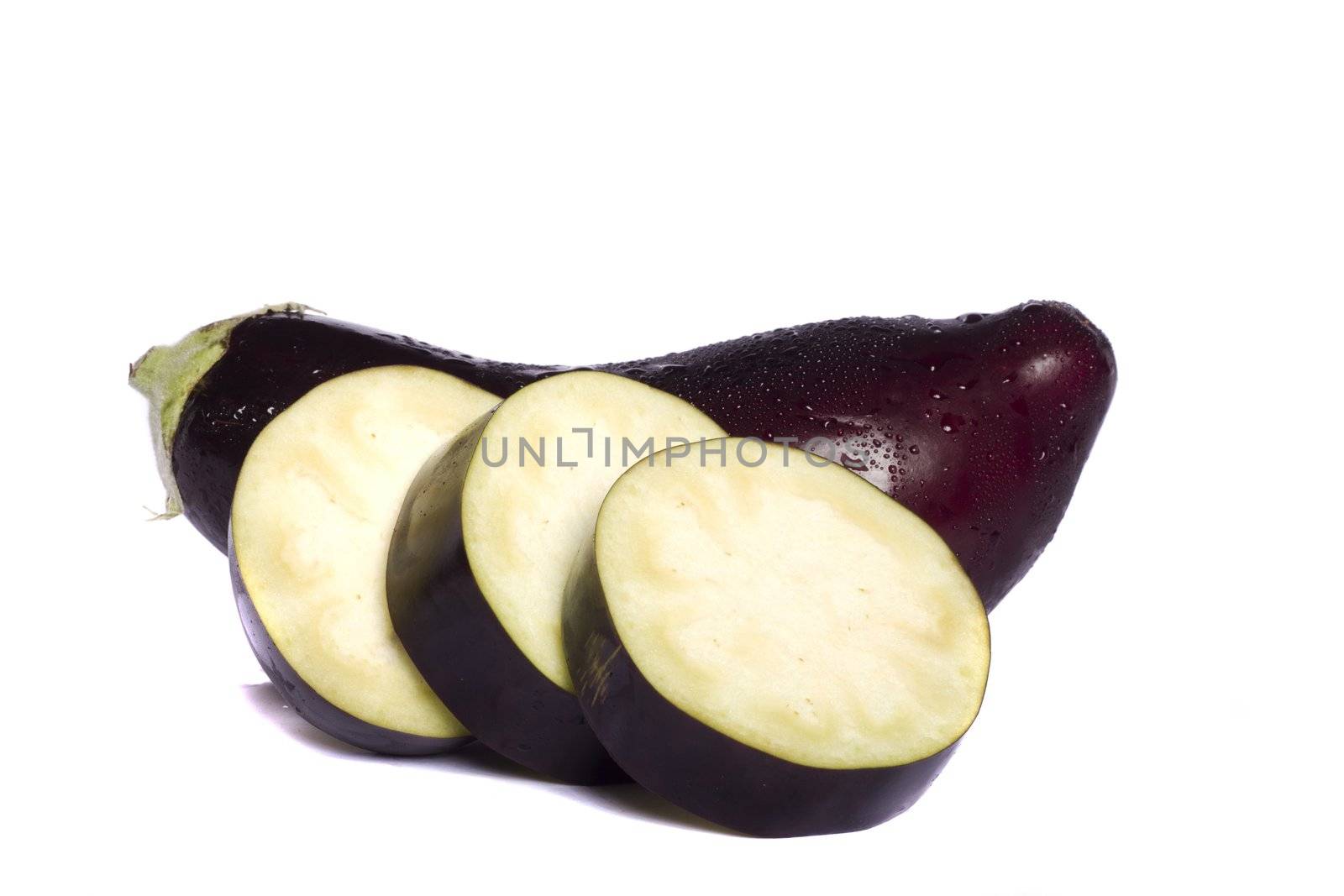 Close up view of an eggplant vegetable isolated on a white background.