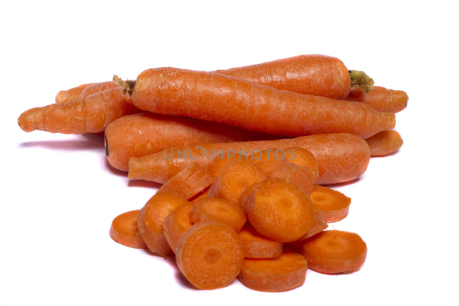 Close up view of a bunch of carrots isolated on a white background.