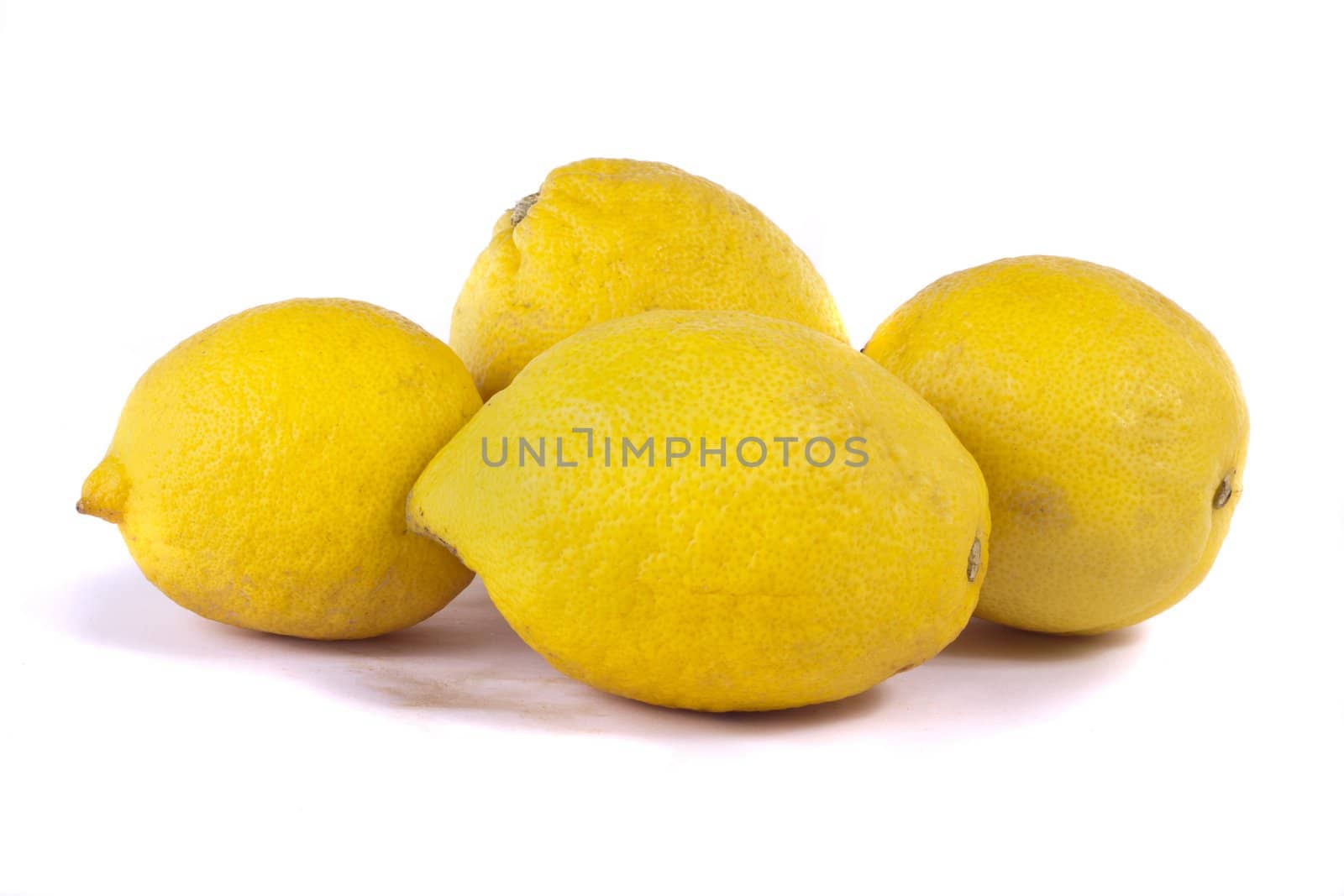 Close up view of bunch of lemons isolated on a white background.