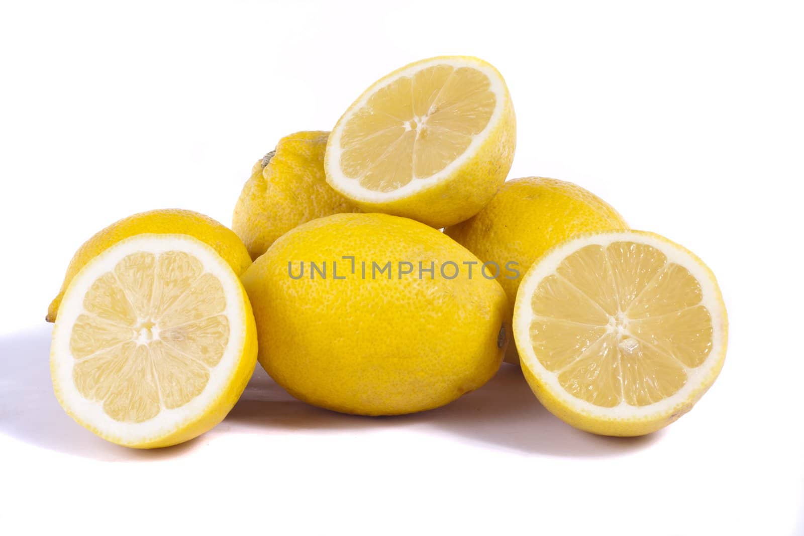 Close up view of bunch of lemons isolated on a white background.