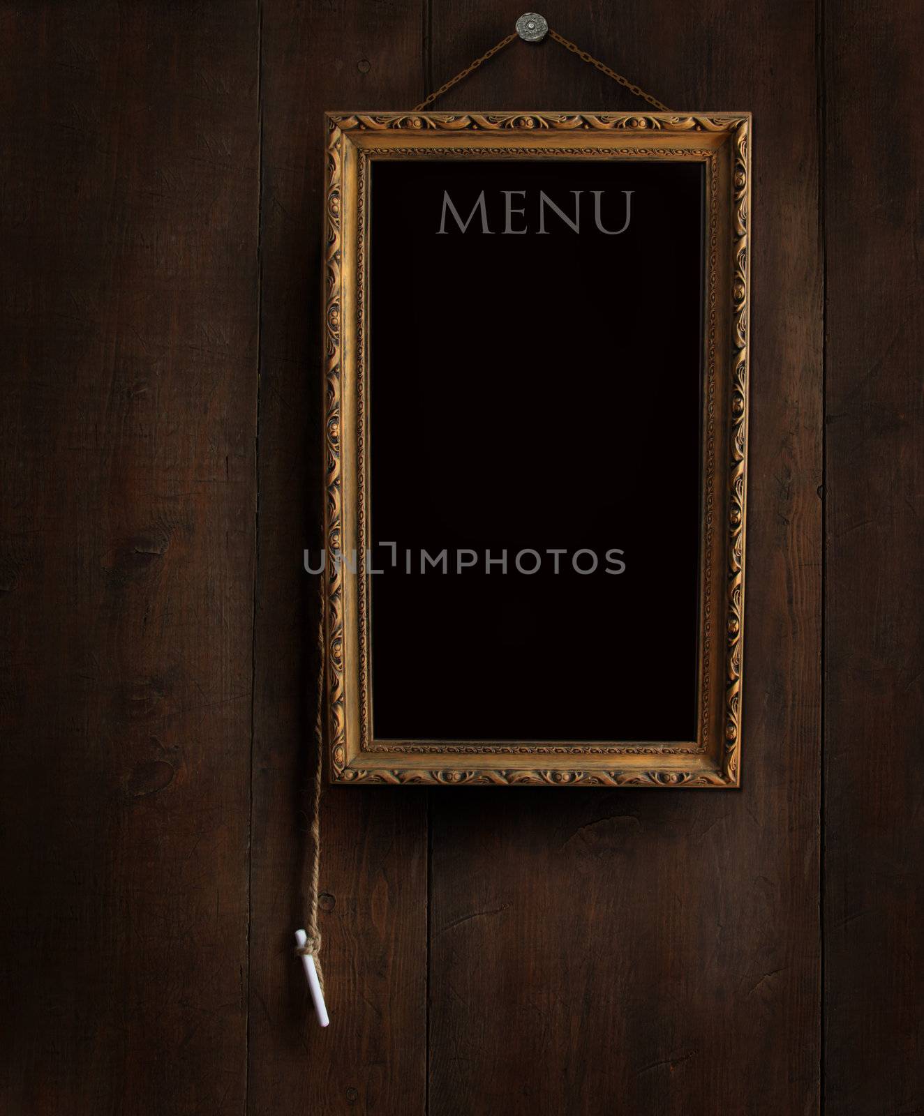 Old chalkboard on wood with copyspace for writing menu 