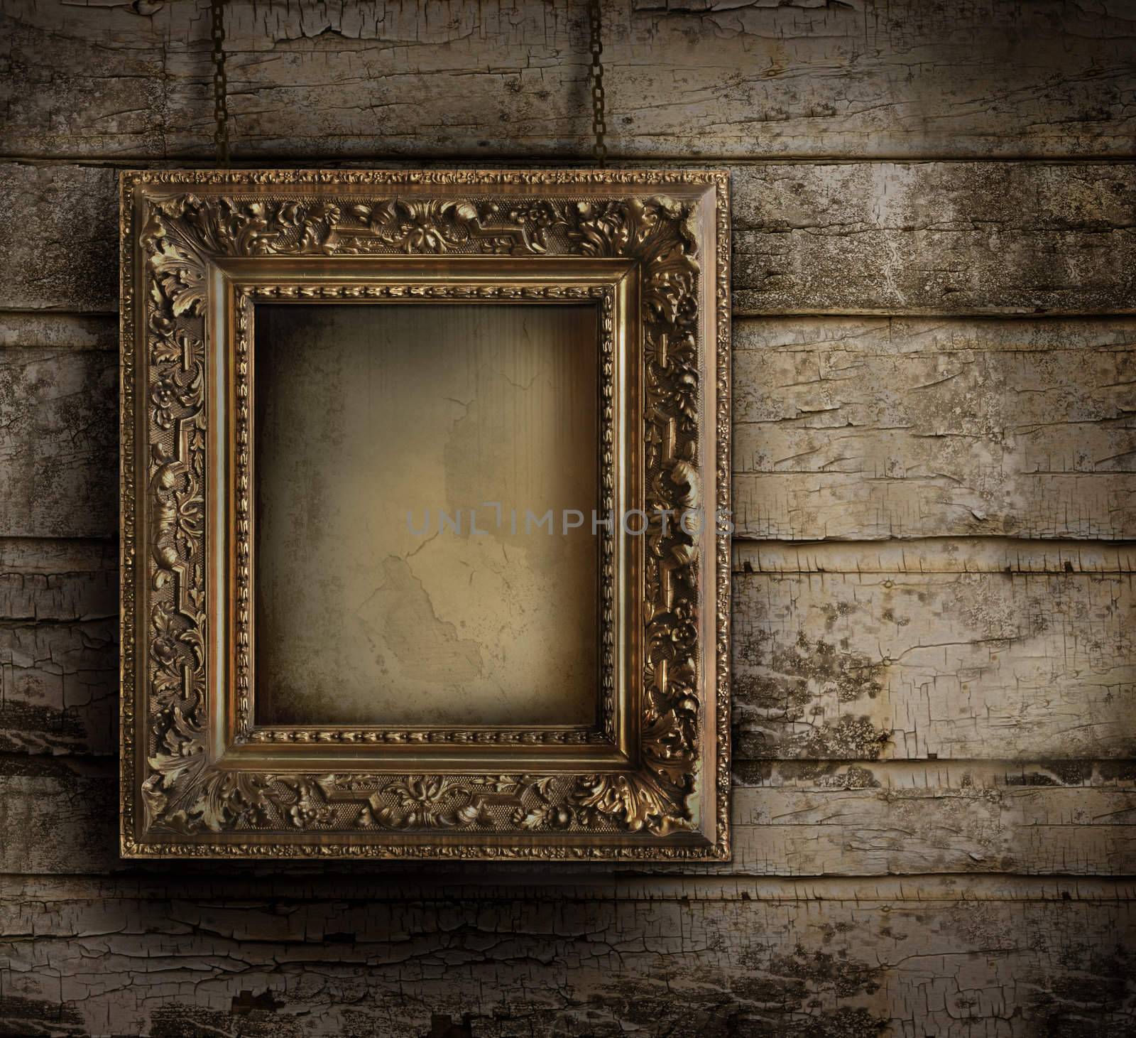 Old frame against a grungy, peeling painted wall