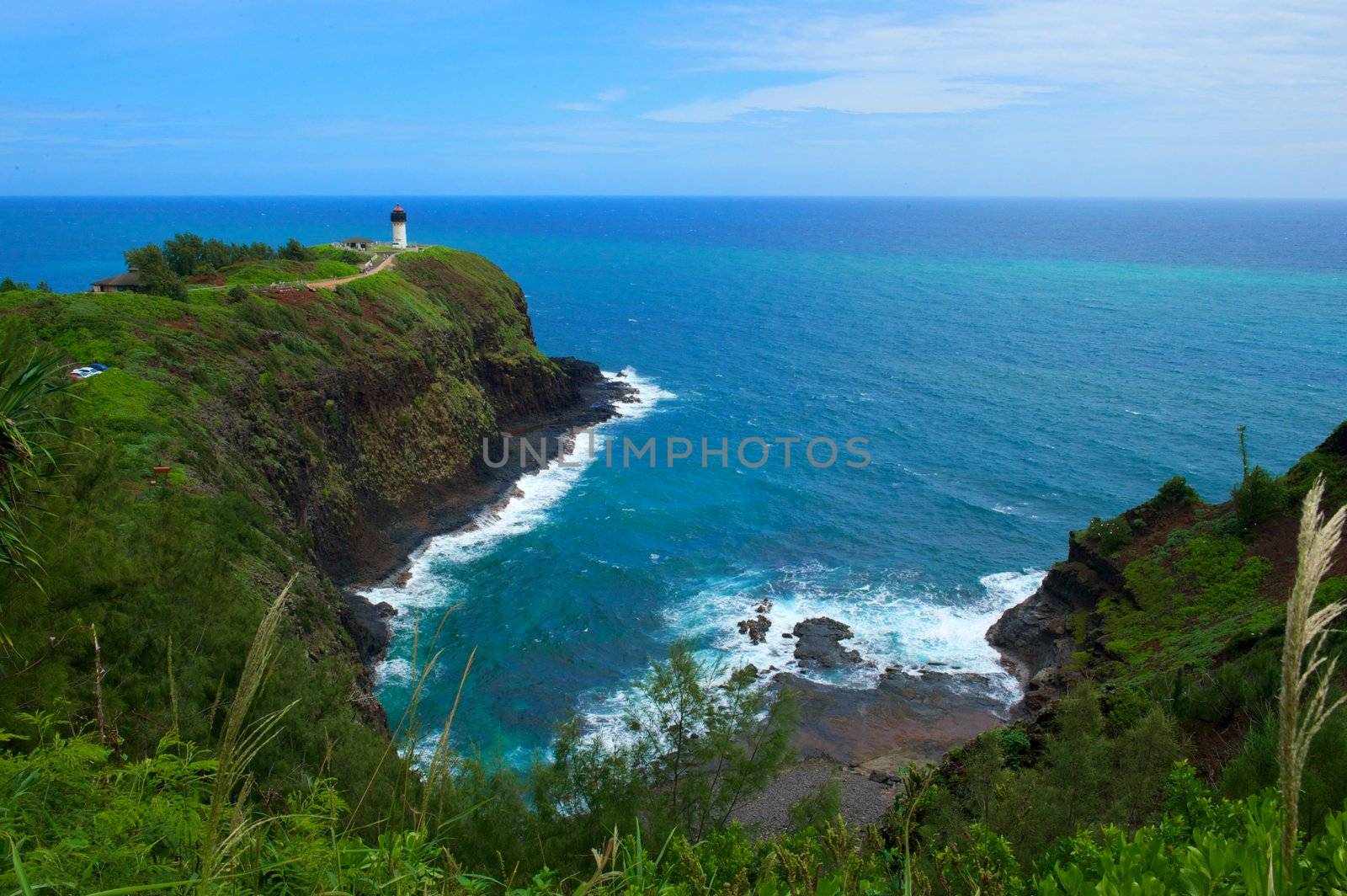 This is a shot of the white lighthouse on the Hawaiian island of Kauai
