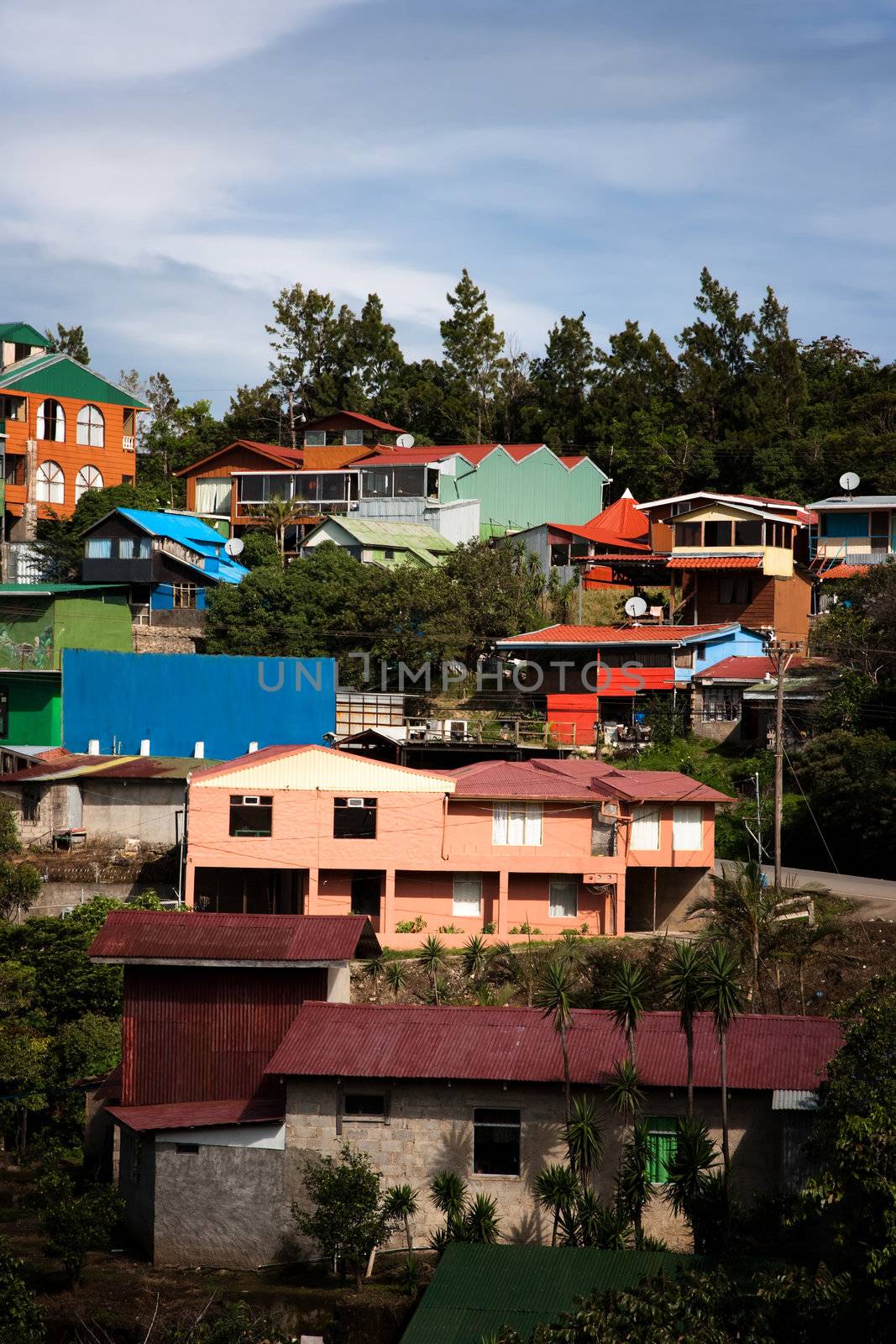 Buildings on a hillside in Santa Elena  by Creatista