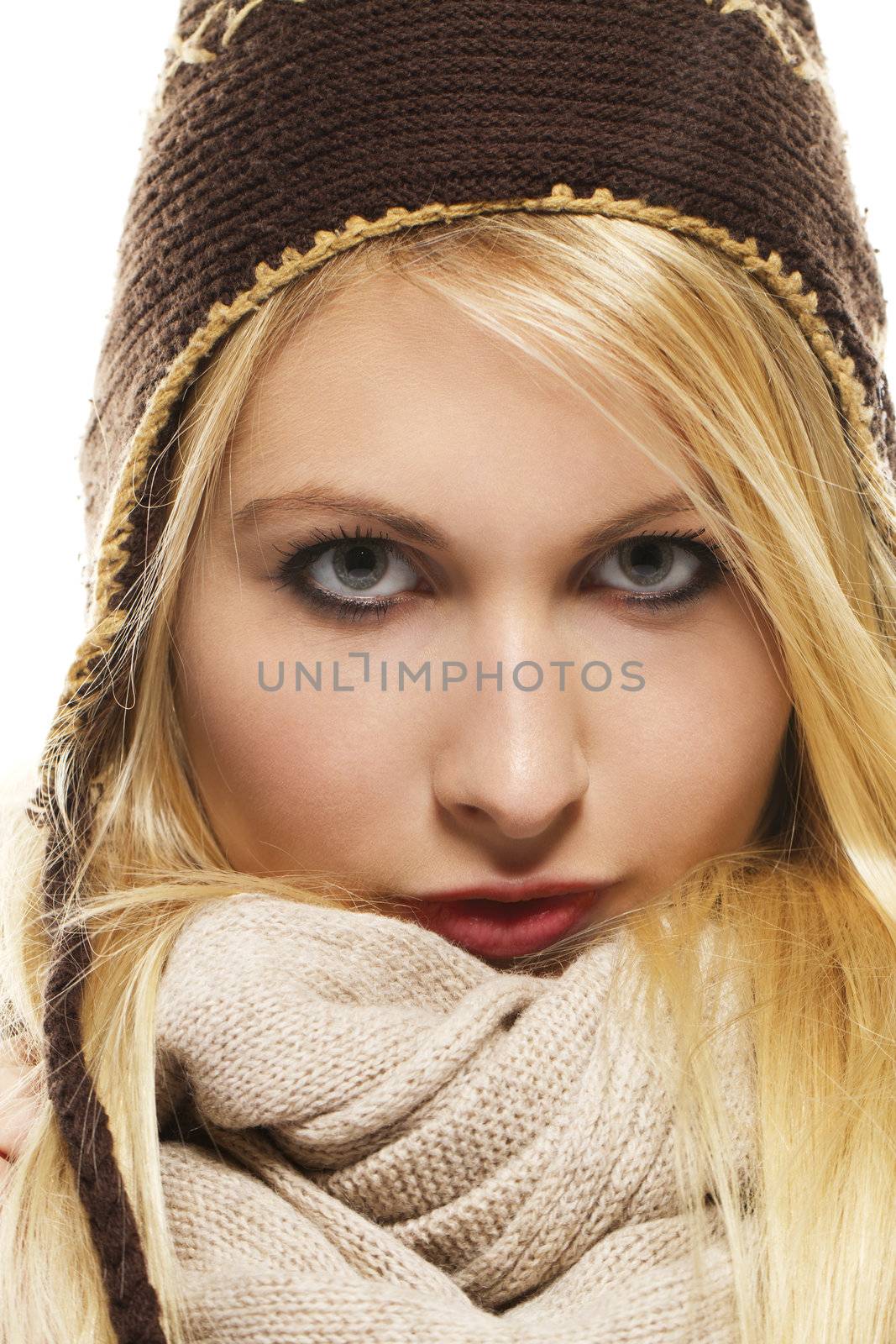 beautiful blonde woman in winter dress on white background