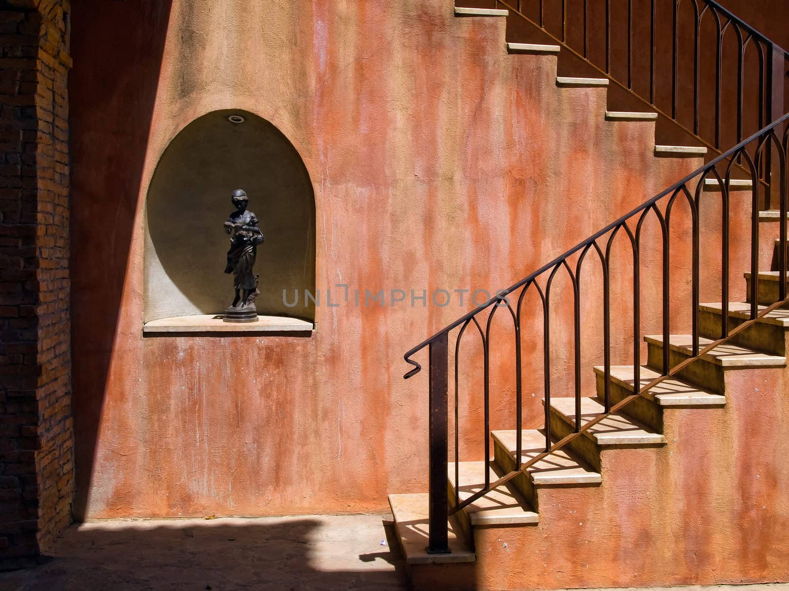 sculpture stand alone in wall and stair