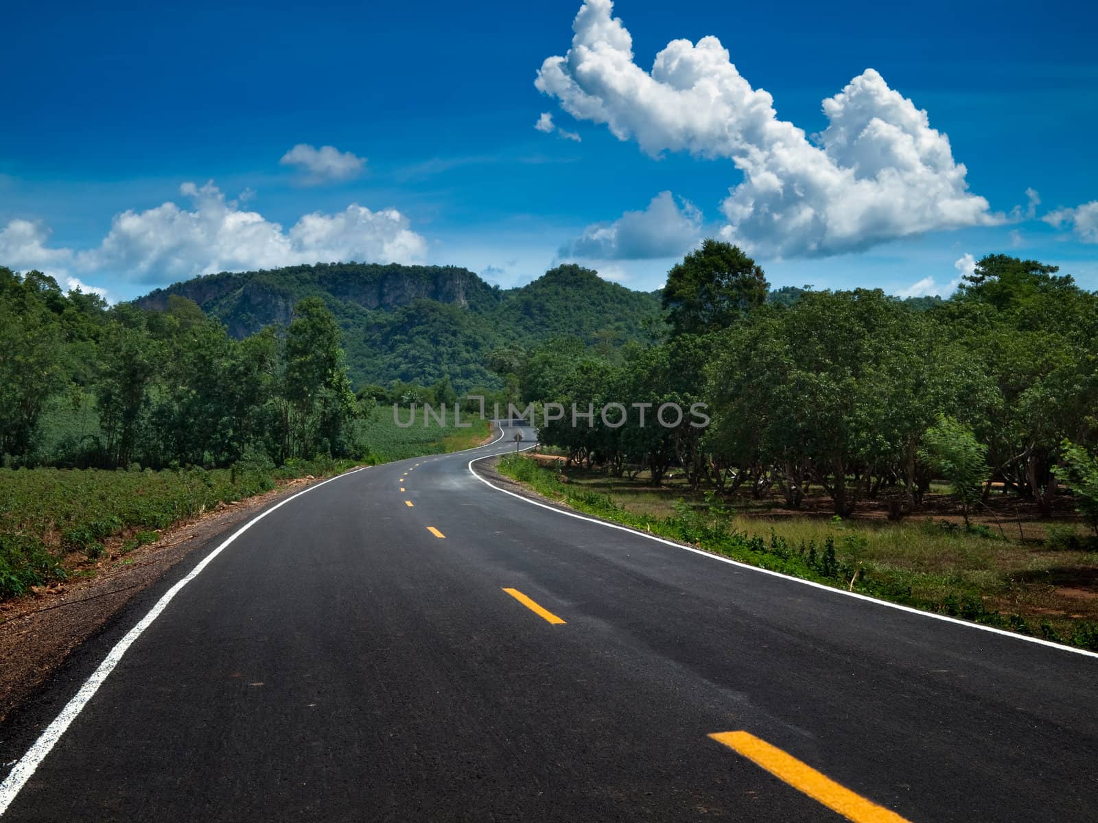 Curve road go to the mountain and sky