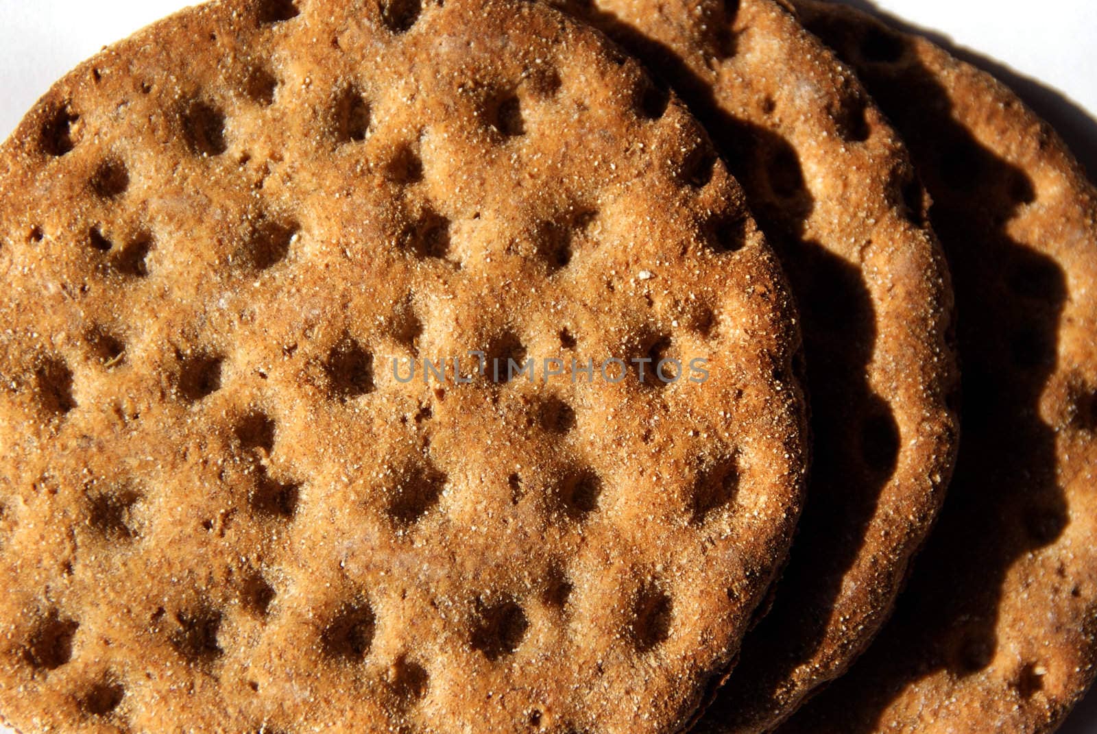 Three slices of hard rye bread close up. Shallow depth of field.