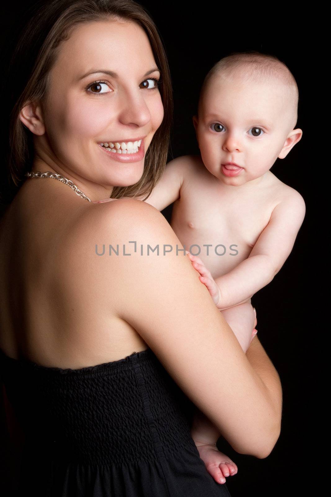 Mother holding baby girl child