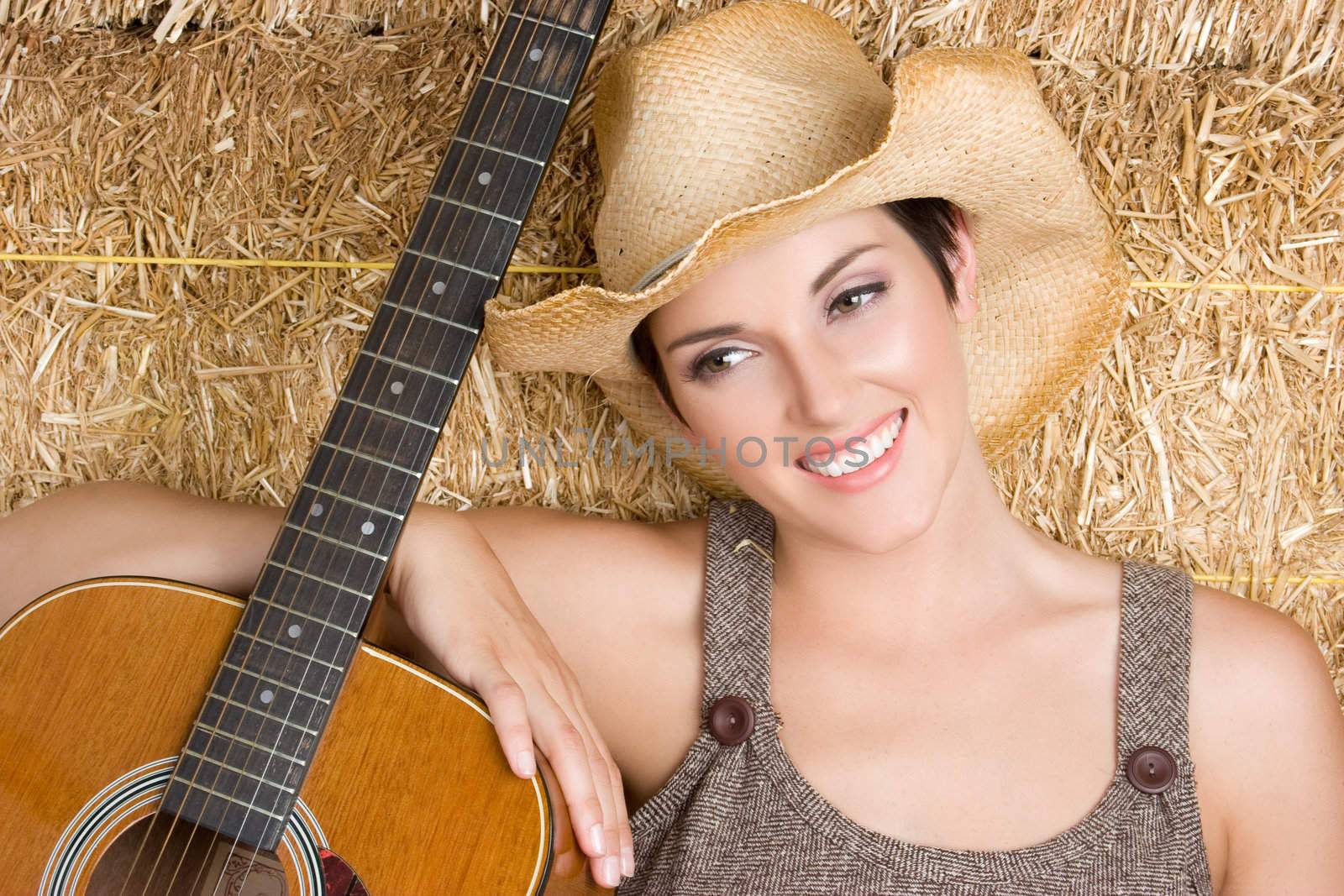 Country musician girl with guitar