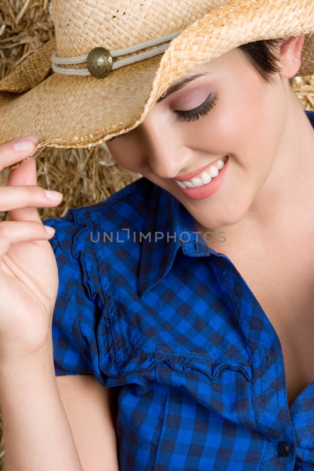 Pretty country girl wearing hat