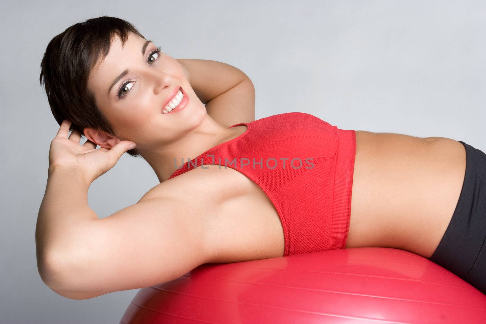 Beautiful smiling sit ups woman