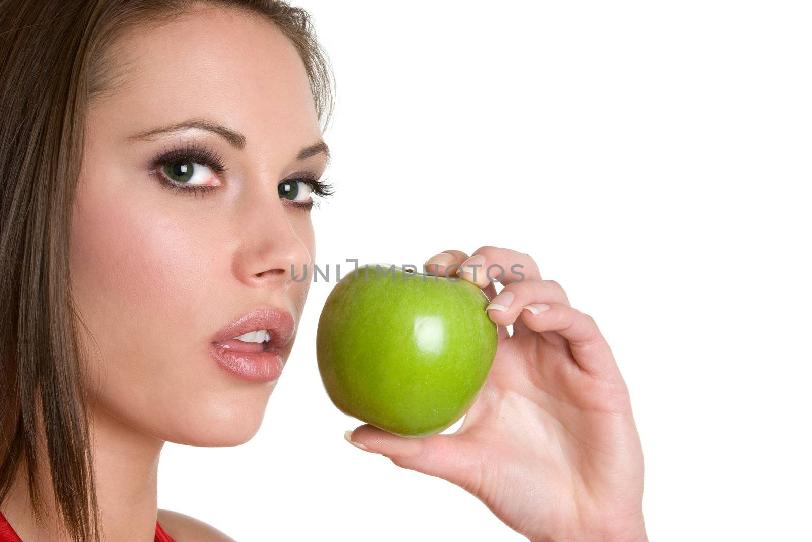 Beautiful young woman eating apple