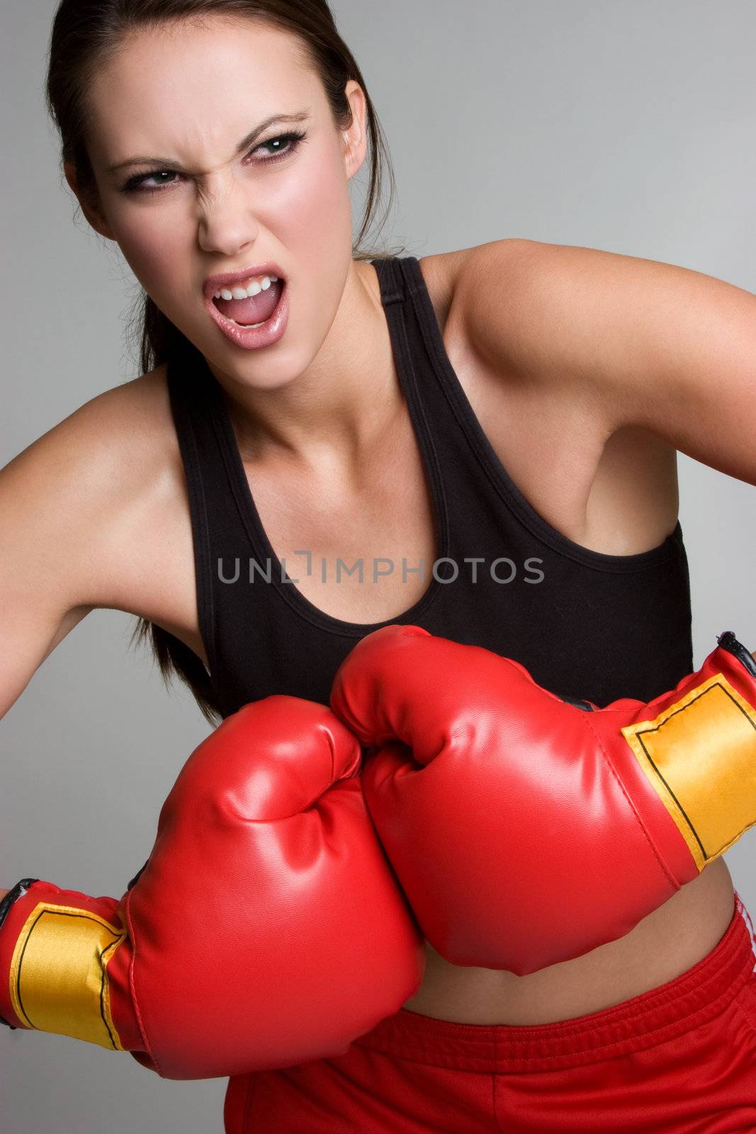 Beautiful aggressive boxing girl