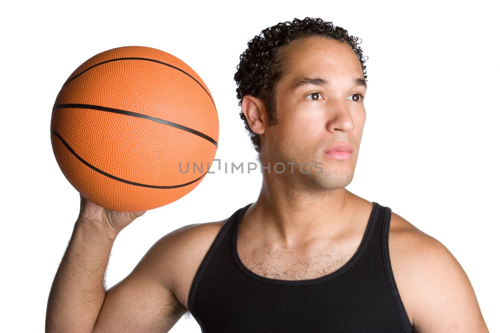 Young isolated man holding basketball