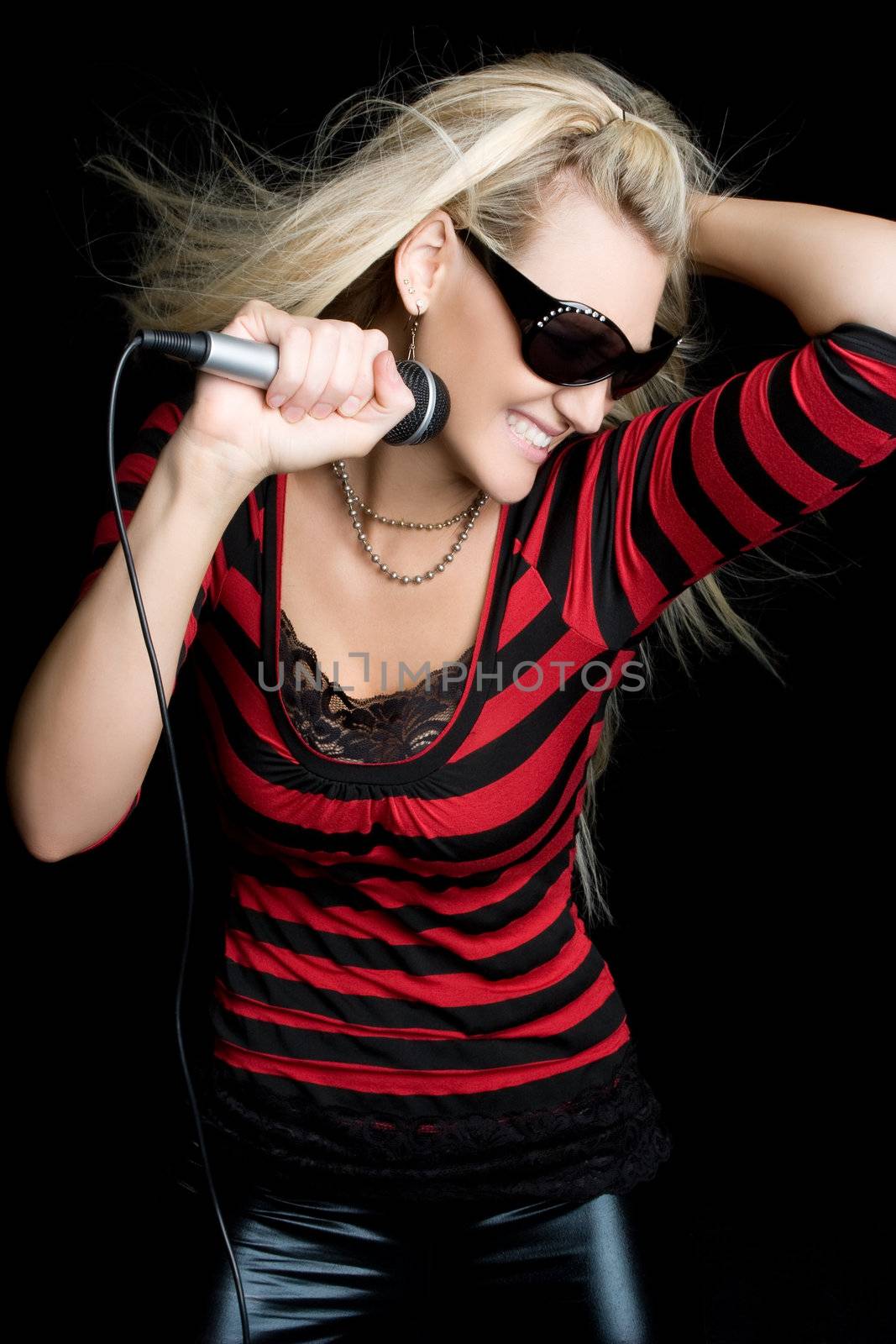 Pretty blond rock star girl singing