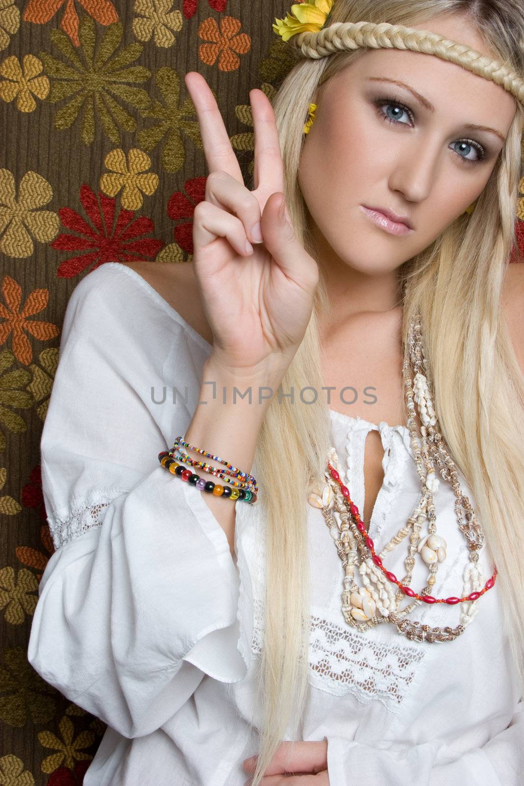 Hippie girl showing peace sign