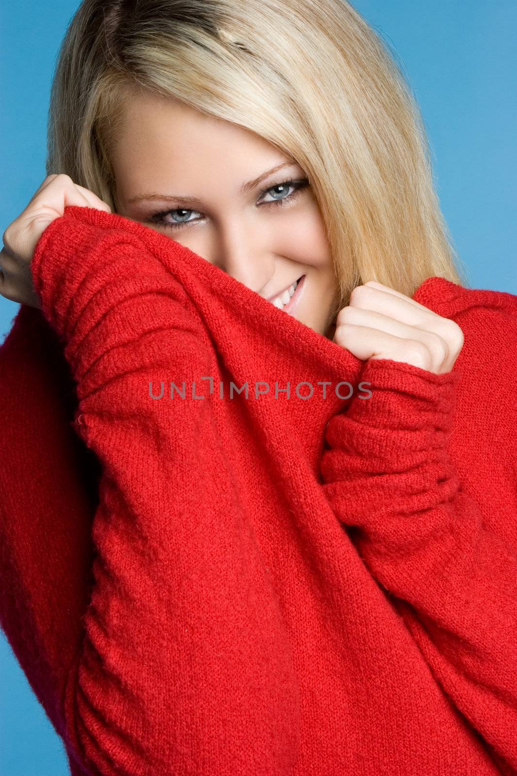 Beautiful woman wearing red sweater