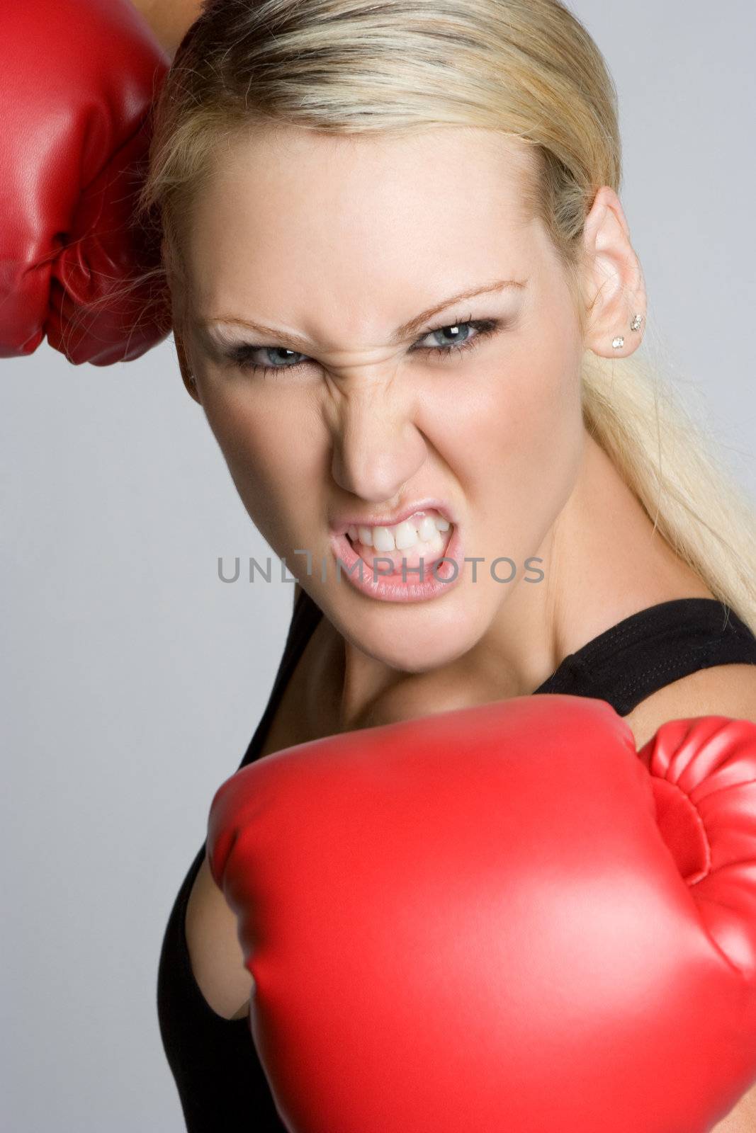 Aggressive blond woman boxing
