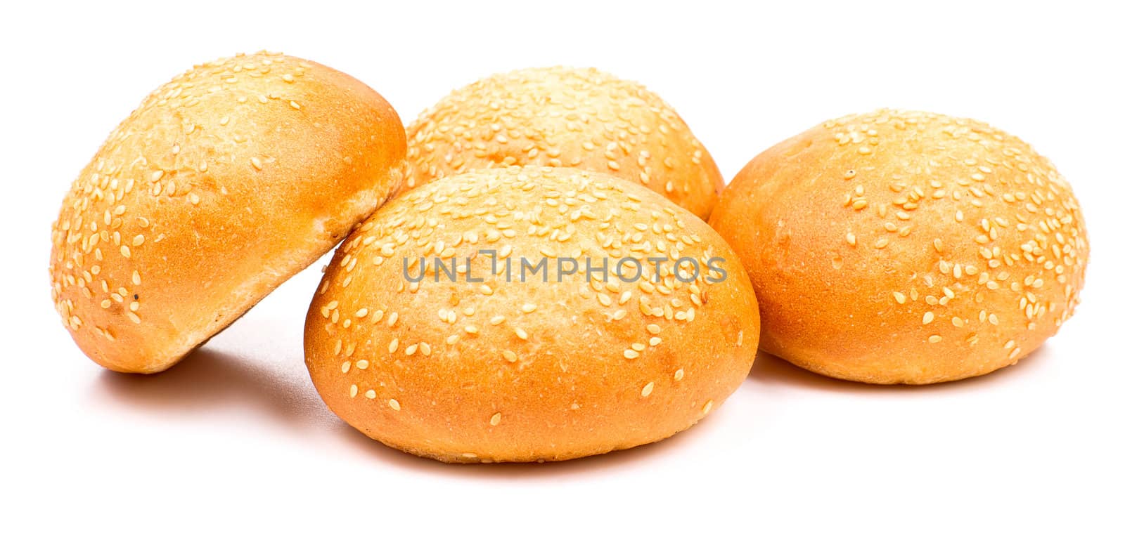 Heap of buns with sesame isolated on the white background