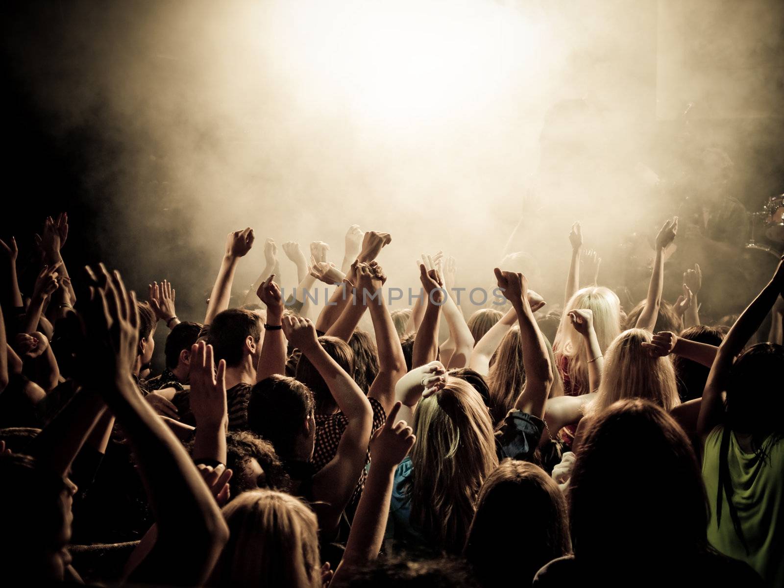 Crowd at a concert with hands uup, high ISO!